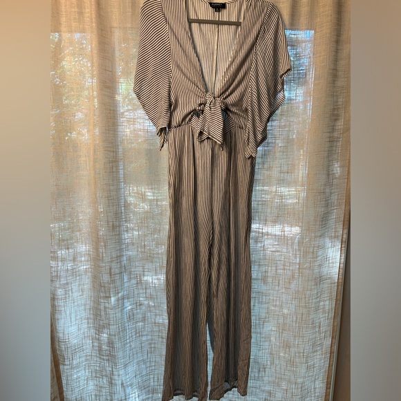 Audrey 3 Plus 1 Black and White Striped Jumpsuit with Cutout and Flared Sleeves. - Picture 8 of 16